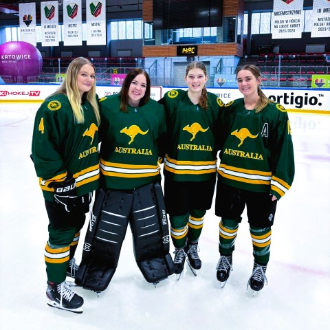 a group of people posing for the camera