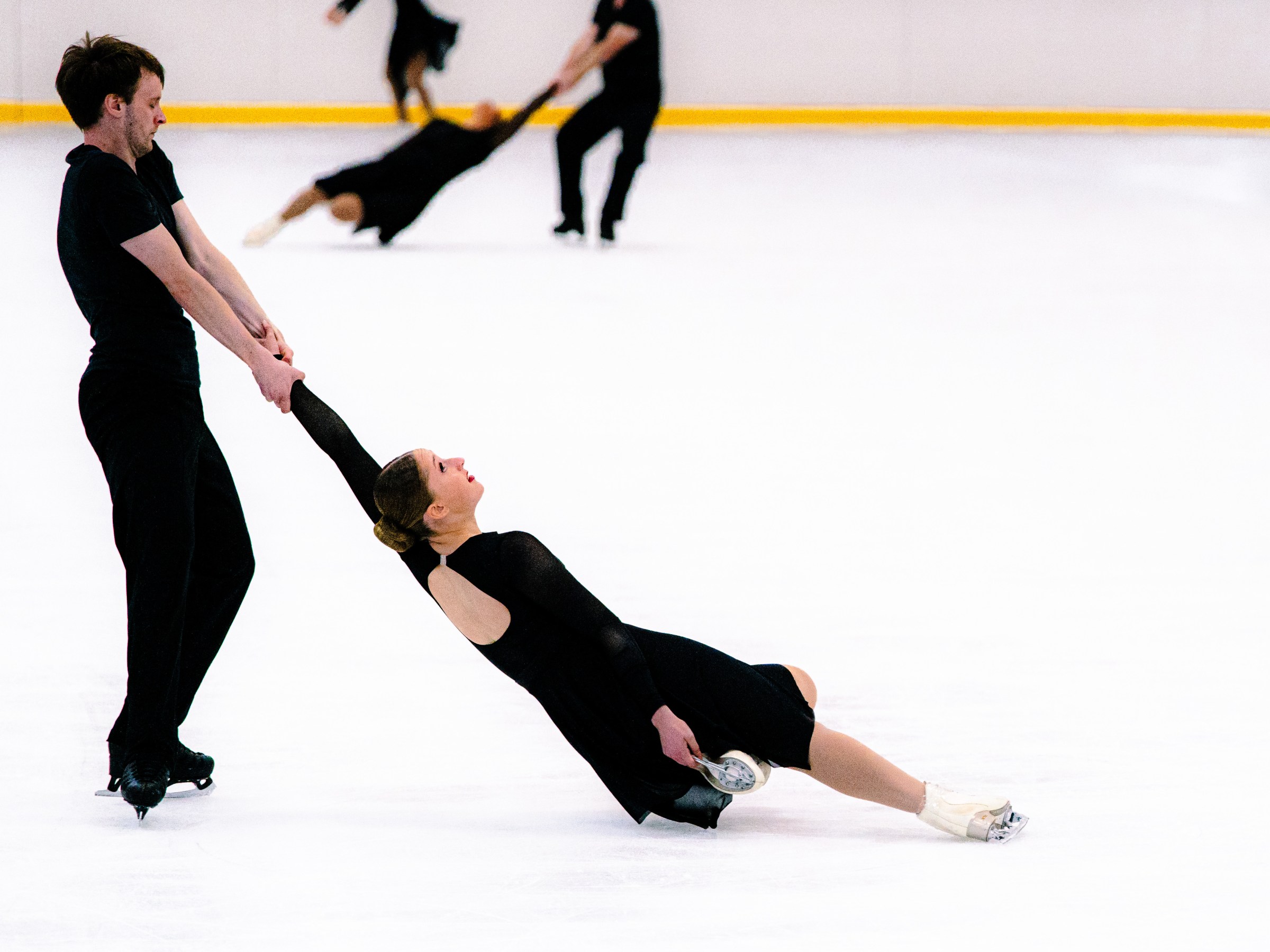 a person riding skis down a snow covered slope